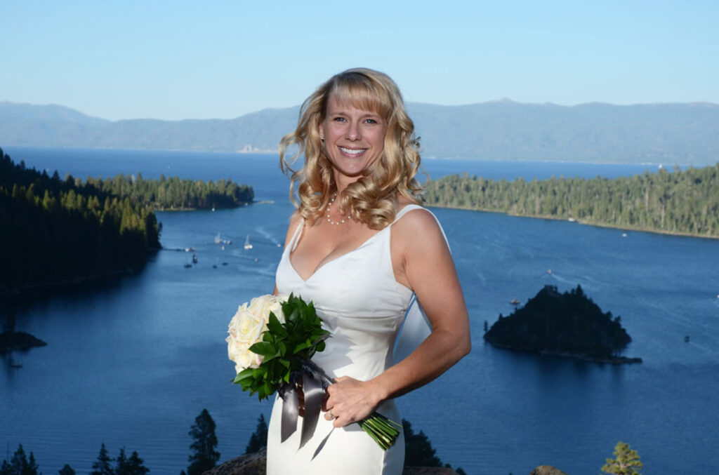 Bride standing on the bluff at Emerald Bay
