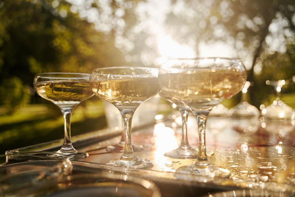 Several champagne glasses on a table