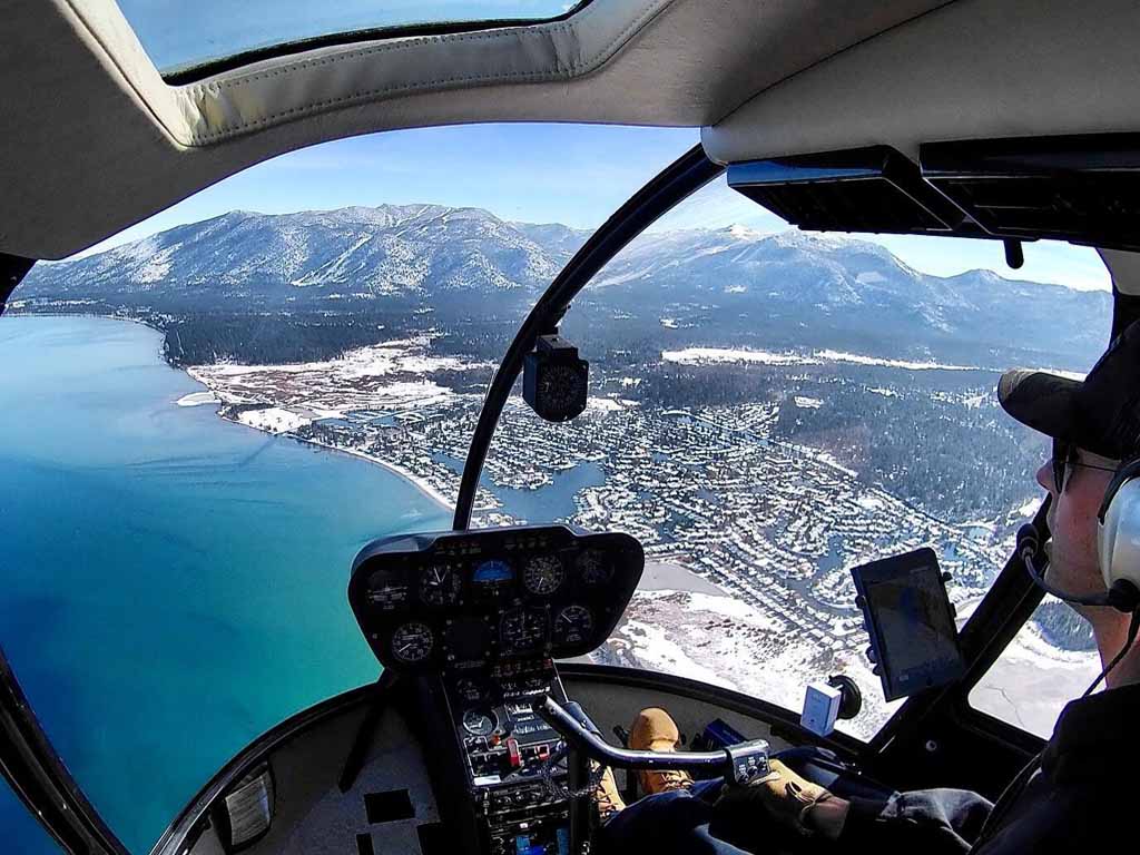 View of Lake Tahoe from inside the helicopter cockpit