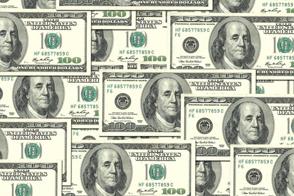 Pile of one hundred dollar bills