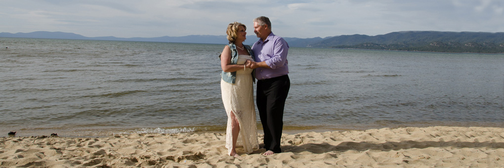 Newlyweds together on beach