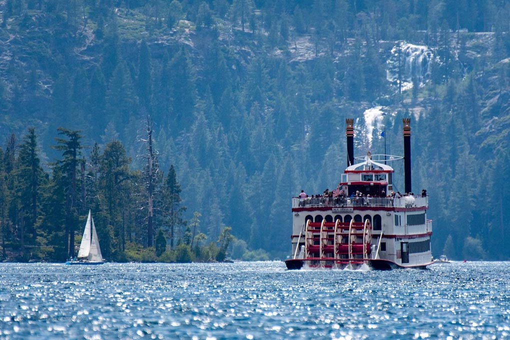 The Dixie paddle wheeler crosses the lake