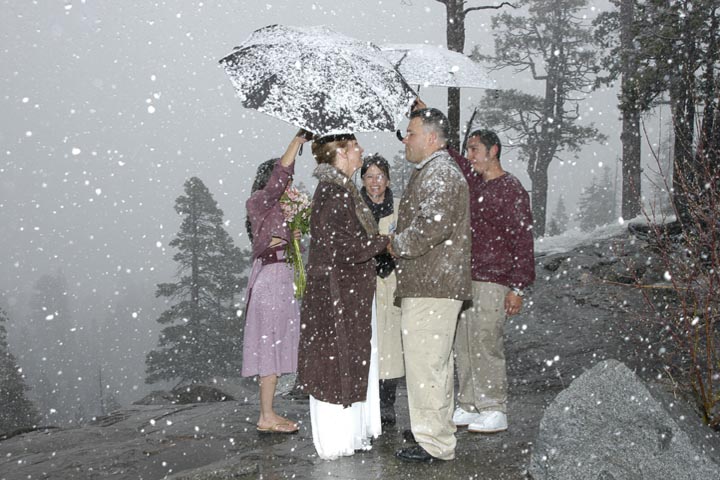 Getting married outdoors while the snow falls