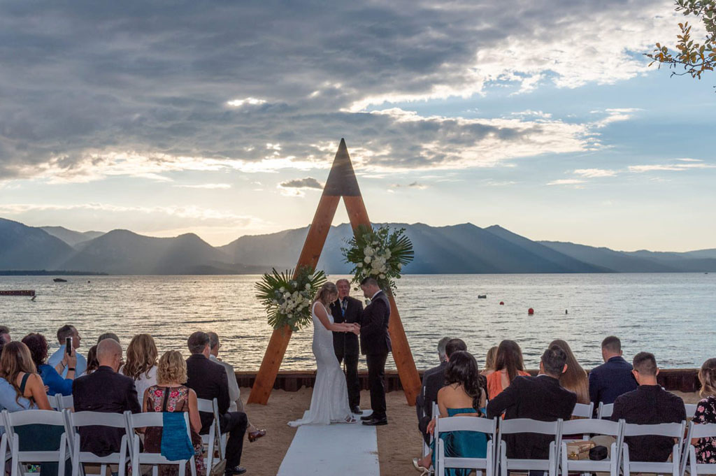 Guests observe the ritual as the bride and groom stand before the pastor