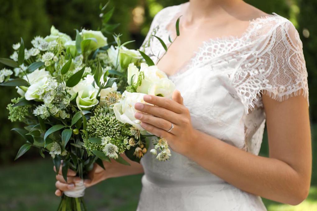 Close-up of a bridal bouquet being held by the bride