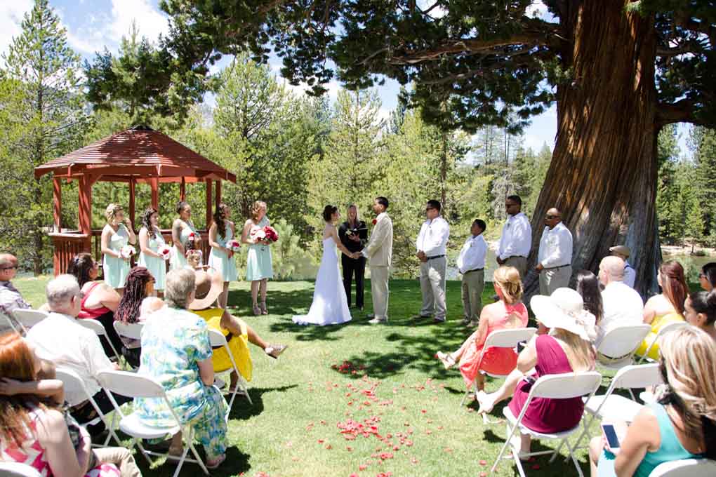 A service in progress at the gazebo with onlooking guests