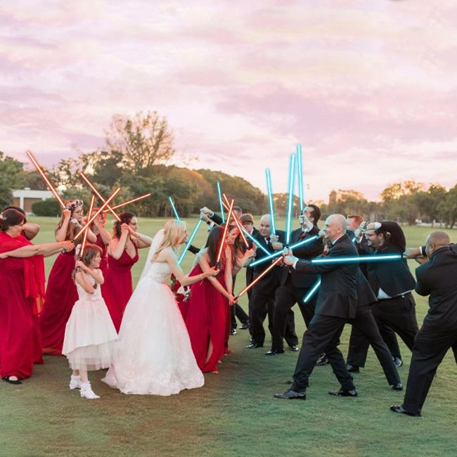 Bridal parties duo with lightsabers
