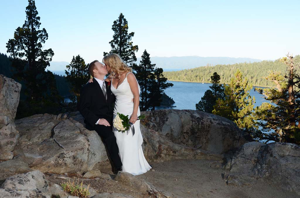 Bridal couple have first kiss on the Emerald Bay overlook
