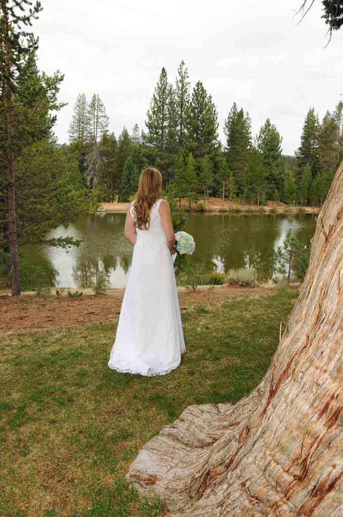 The bride looks onward towards Lake Baron at Tahoe Paradise Park