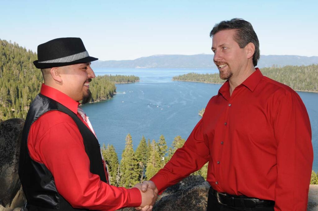 The best man shakes hand with the bridegroom