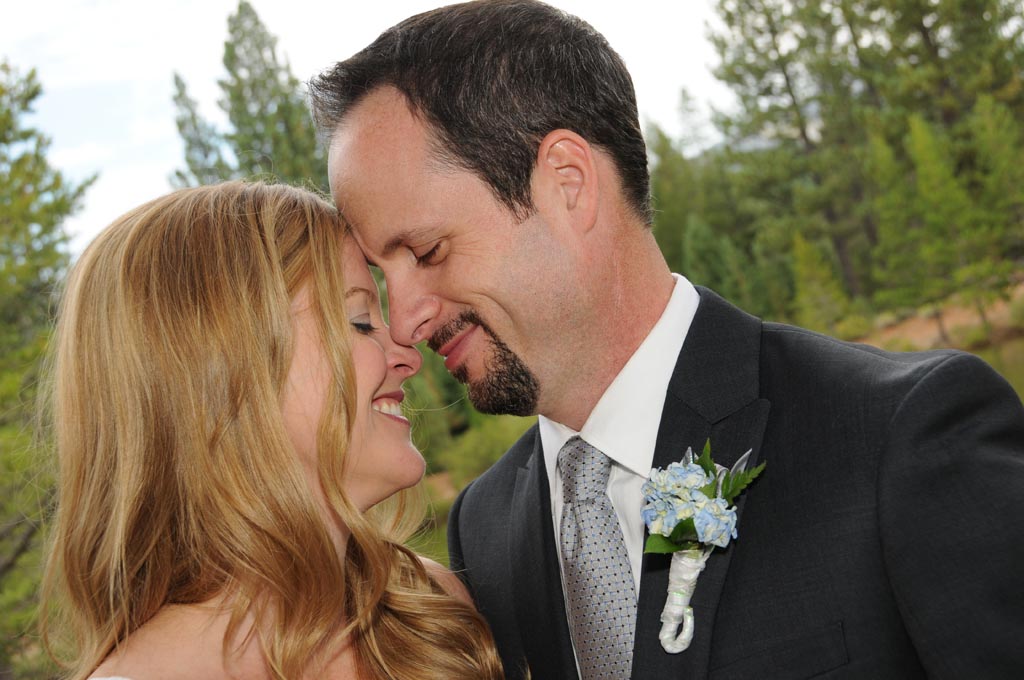 The wedded pair put heads together in affection