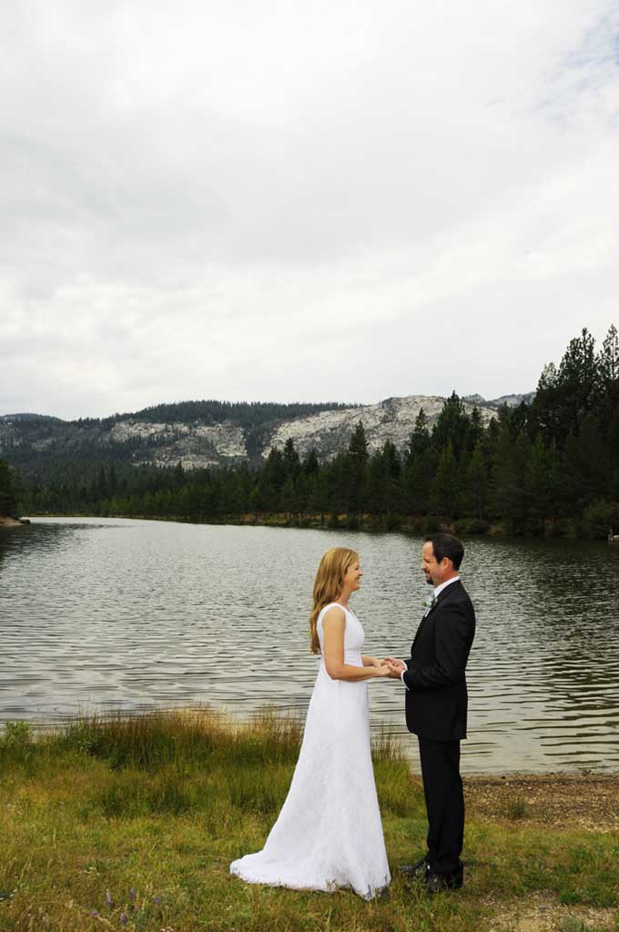 Spouses holding each other after the nuptial service