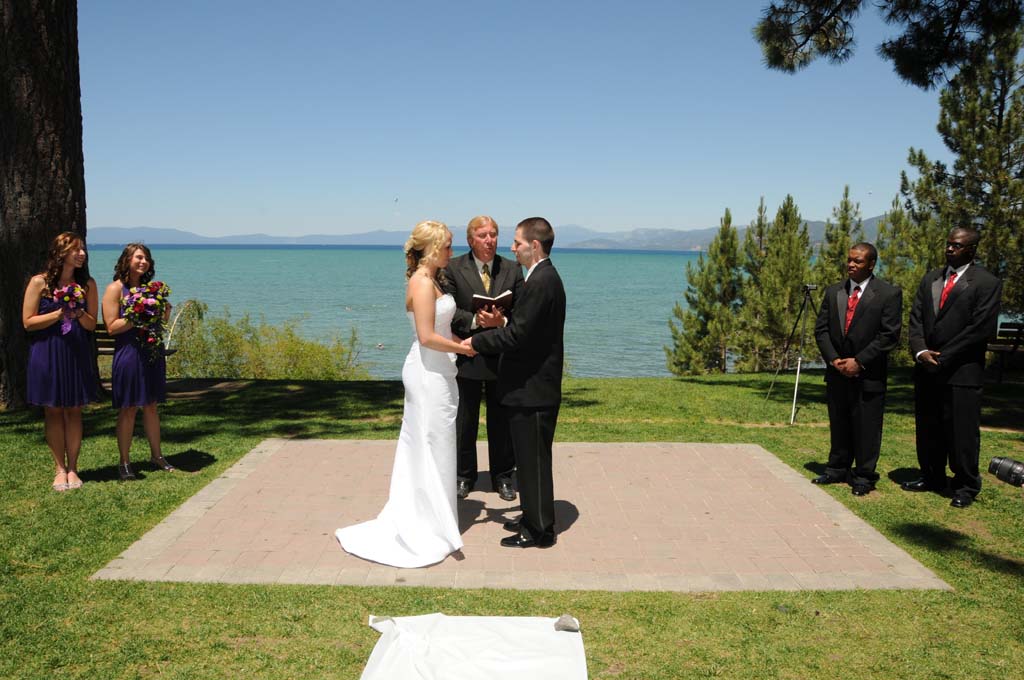 Wedding ceremony in progress at Regan Beach