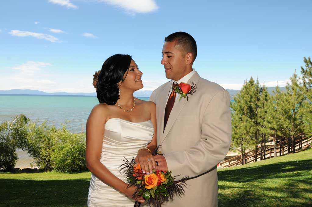 Couple displaying their wedding rings