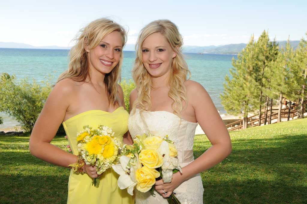 Happy bride with her bridesmaid