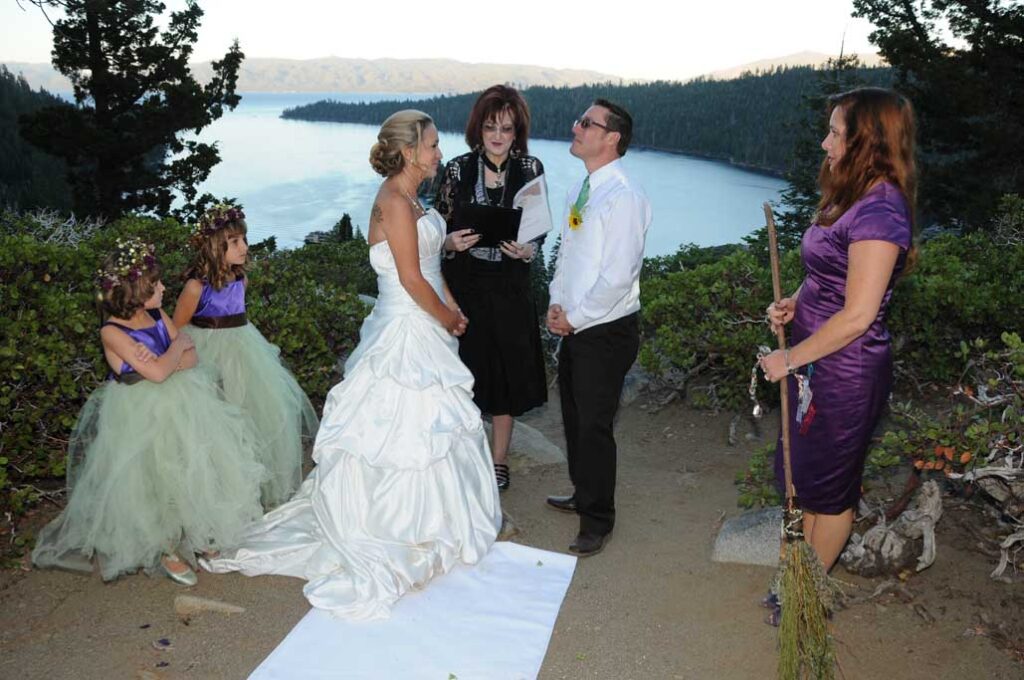 The wedding ceremony in progress near the bluff overlooking the bay