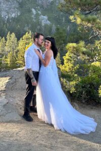 Smiling bride with her groom