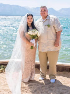 Newly married couple poses for a photo